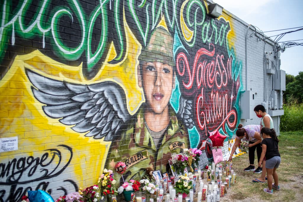 People pay their respects at a mural of Vanessa Guillen on July 6, 2020 in Austin, Texas.