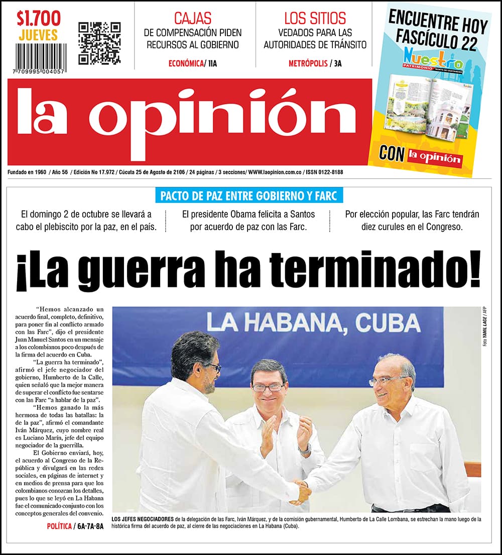 "¡La guerra ha terminado!", tituló el diario
<a href="http://www.laopinion.com.co/#ATHS" target="_blank"> La Opinión</a> de Cúcuta, junto a la foto que marcó el cierre de las negociaciones en La Habana.