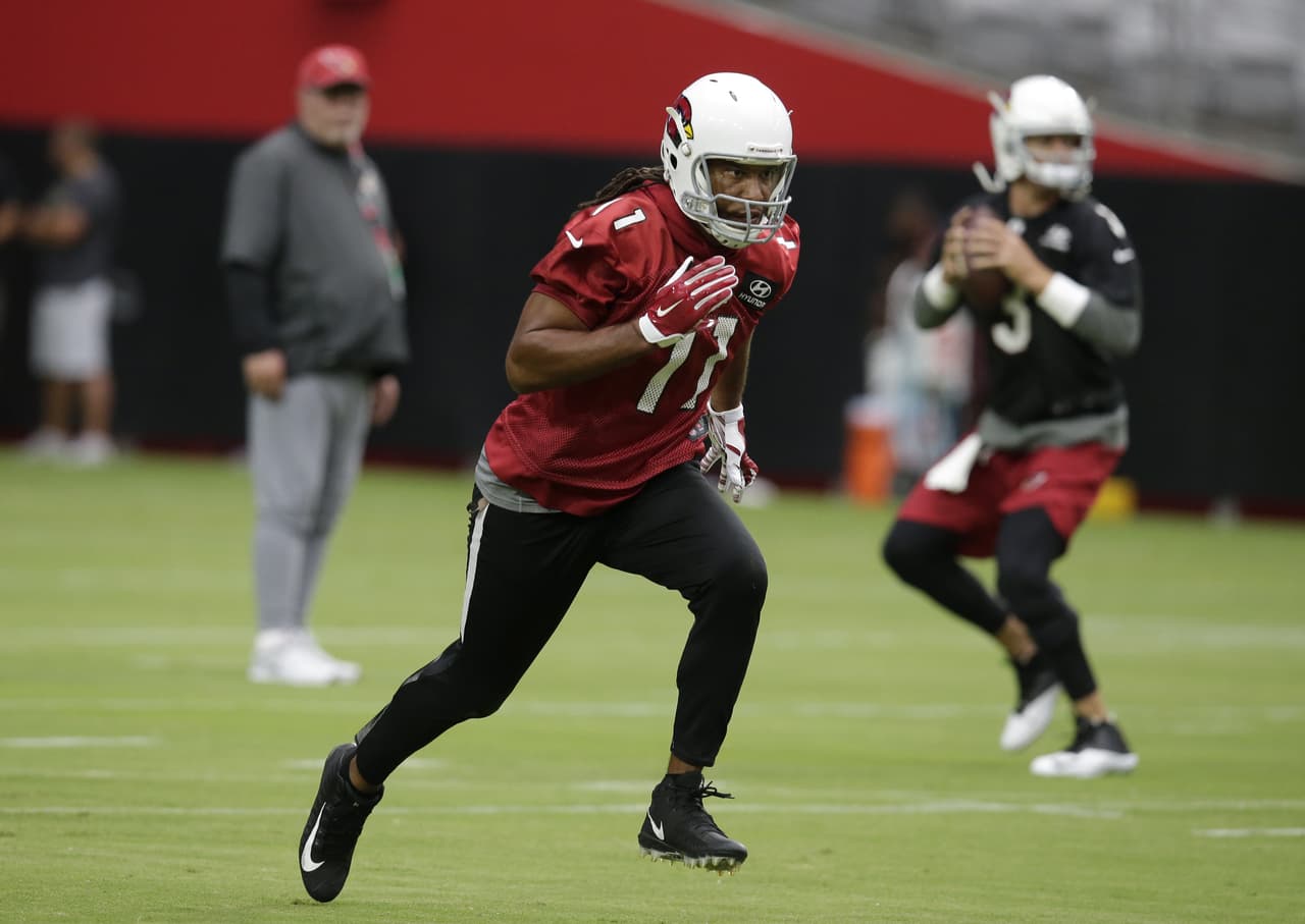 Arizona Cardinals wide receiver Larry Fitzgerald (11) works out during a Cardinals' camp, Saturday, July 22, 2017, in Glendale, Ariz. (AP Photo/Rick Scuteri)