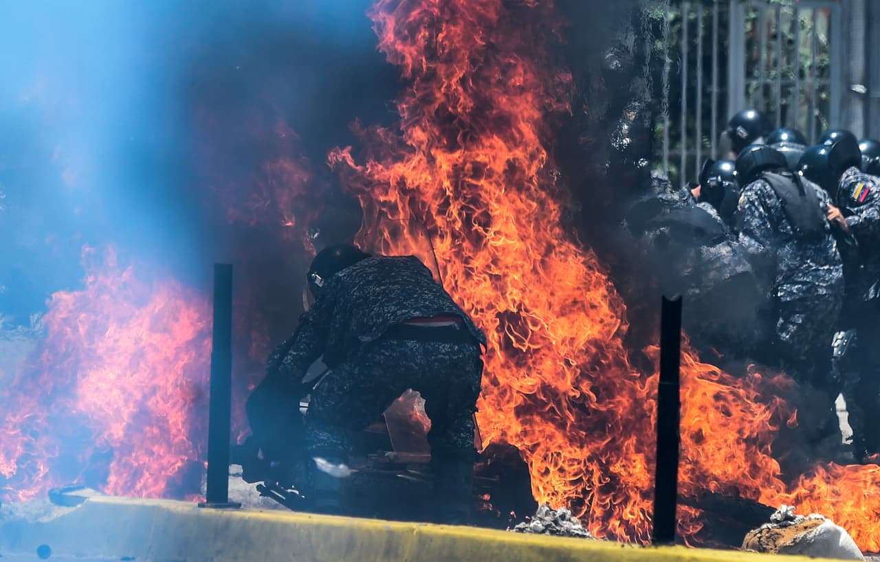 Members of the police patrol got off the bikes to help their comrades and fired shotgun pellets and tear gas to keep journalists away.