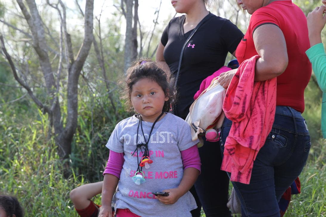 Arantza just arrived to Texas with her mother and sister from El Salvador. She carries in her hand a shabby, broken Blackberry found on the way. Tomorrow is her birthday. With her fingers, she tells us how old she'll be: 4.