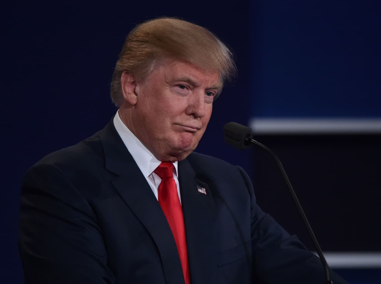 Republican presidential nominee Donald Trump listens during the third and final US presidential debate with Democratic nominee Hillary Clinton at the Thomas & Mack Center on the campus of the University of Las Vegas in Las Vegas, Nevada on October 19, 2016. / AFP / Paul J. Richards (Photo credit should read PAUL J. RICHARDS/AFP/Getty Images)