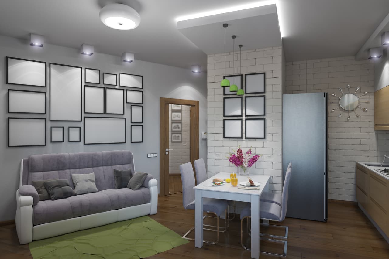 Otro ejemplo perfecto de cómo puedes integrar el comedor entre la cocina y la sala, ocupando el mínimo espacio.