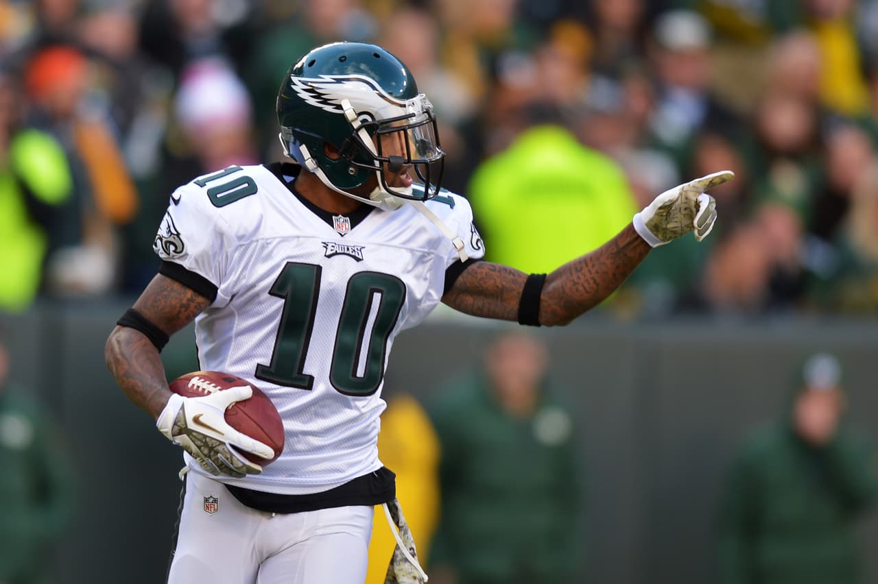 DeSean Jackson #10 of the Philadelphia Eagles celebrates a touchdown against the Green Bay Packers at Lambeau Field on November 10, 2013 in Green Bay, Wisconsin.