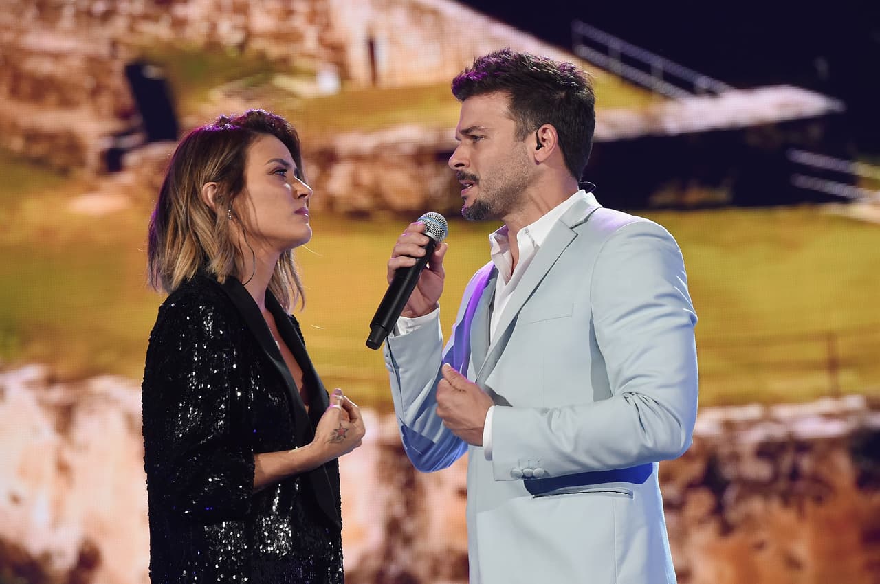 MIAMI, FL - OCTOBER 14: In this handout photo provided by One Voice: Somos Live!, Kany Garcia and Pedro Capo perform onstage at One Voice: Somos Live! A Concert For Disaster Relief at Marlins Park on October 14, 2017 in Miami, Florida. (Photo by Rick Diamond/One Voice: Somos Live!/Getty Images)