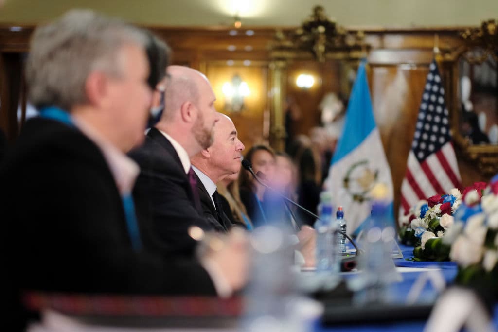 Secretary of Homeland Security Alejandro Mayorkas listens to Guatemalan President Alejandro Giammattei (not in frame) on July 06, 2021 in Guatemala City.