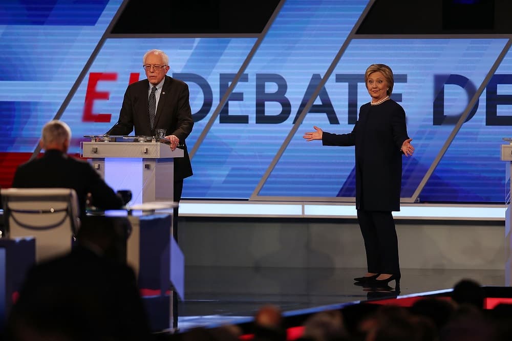 Clinton and Sanders compete for Latino vote; vow to end child deportations