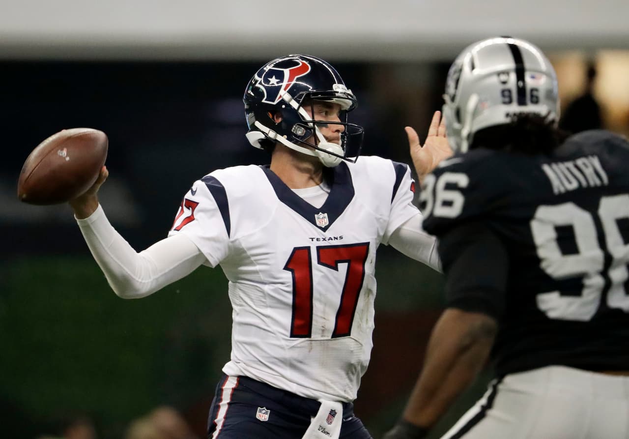 Houston Texans quarterback Brock Osweiler throws a pass during the first half of an NFL football game against the Oakland Raiders Monday, Nov. 21, 2016, in Mexico City. (AP Photo/Rebecca Blackwell)