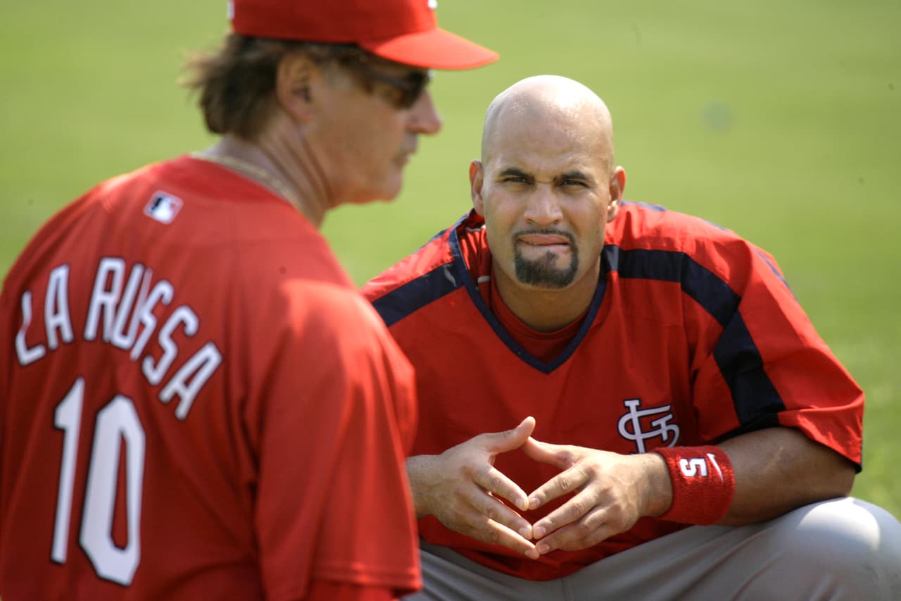 <b>Albert Pujols y Tony La Russa, de los Cardinals de St Louis.</b> Cuando el equipo se impuso en la Serie Mundial de 2011, ni Pujols, jugador (a la derecha en la foto), ni La Russa, el manager del equipo, atendieron la invitación de Obama a la Casa Blanca. Ninguno de los dos dio una explicación.