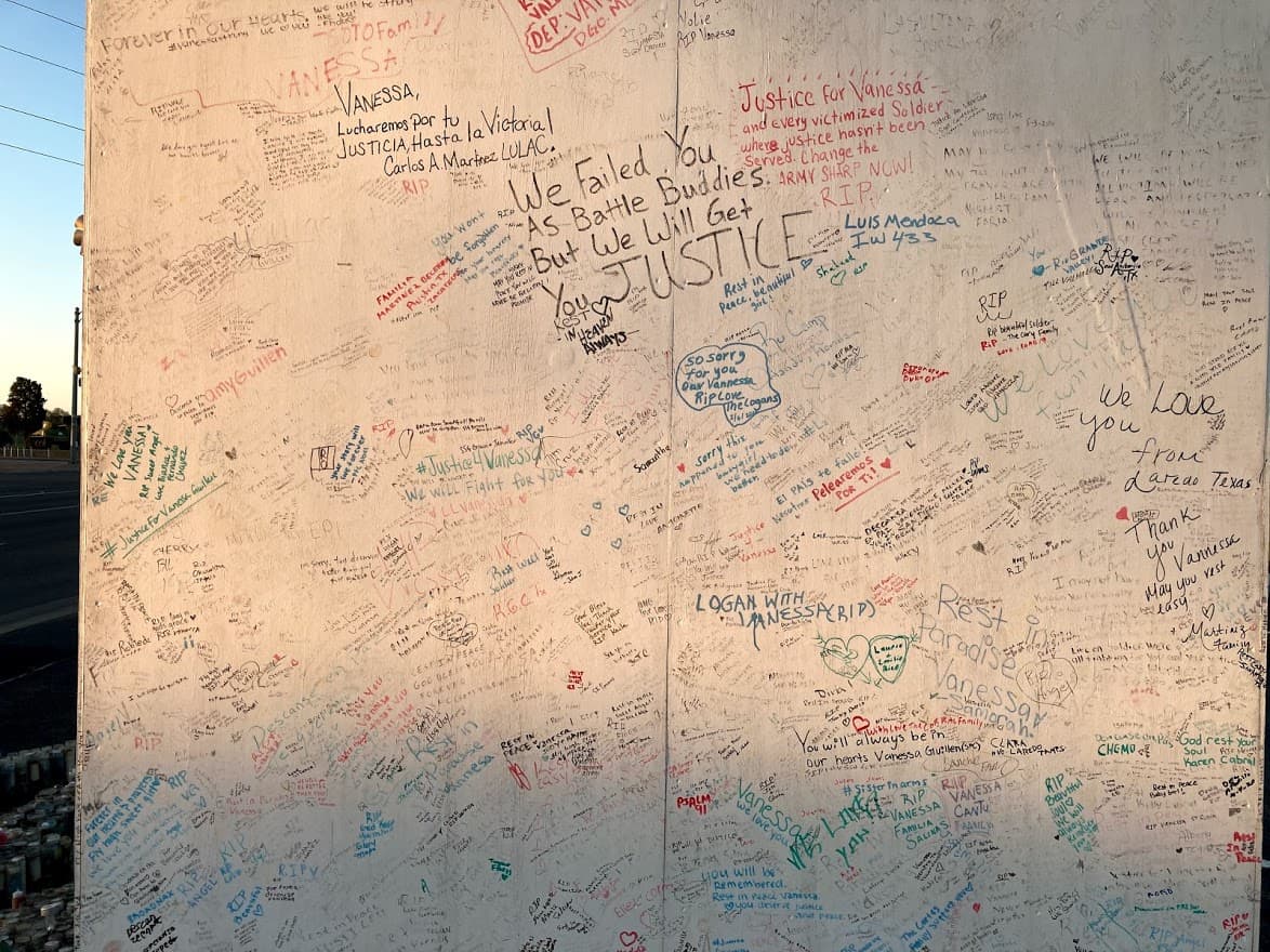 The back of a mural to Vanessa Guillen near the entrance of the Fort Hood military base where she was killed. It contains hundreds of well-wishing messages. "We have failed you as Battle Buddies, but we will bring you justice."