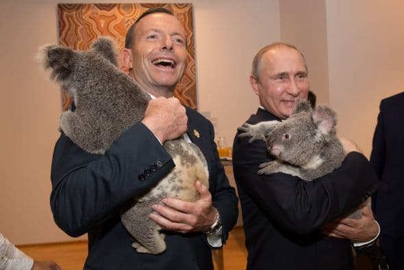 Abbott acompañando al presidente ruso Vladimir Putin.