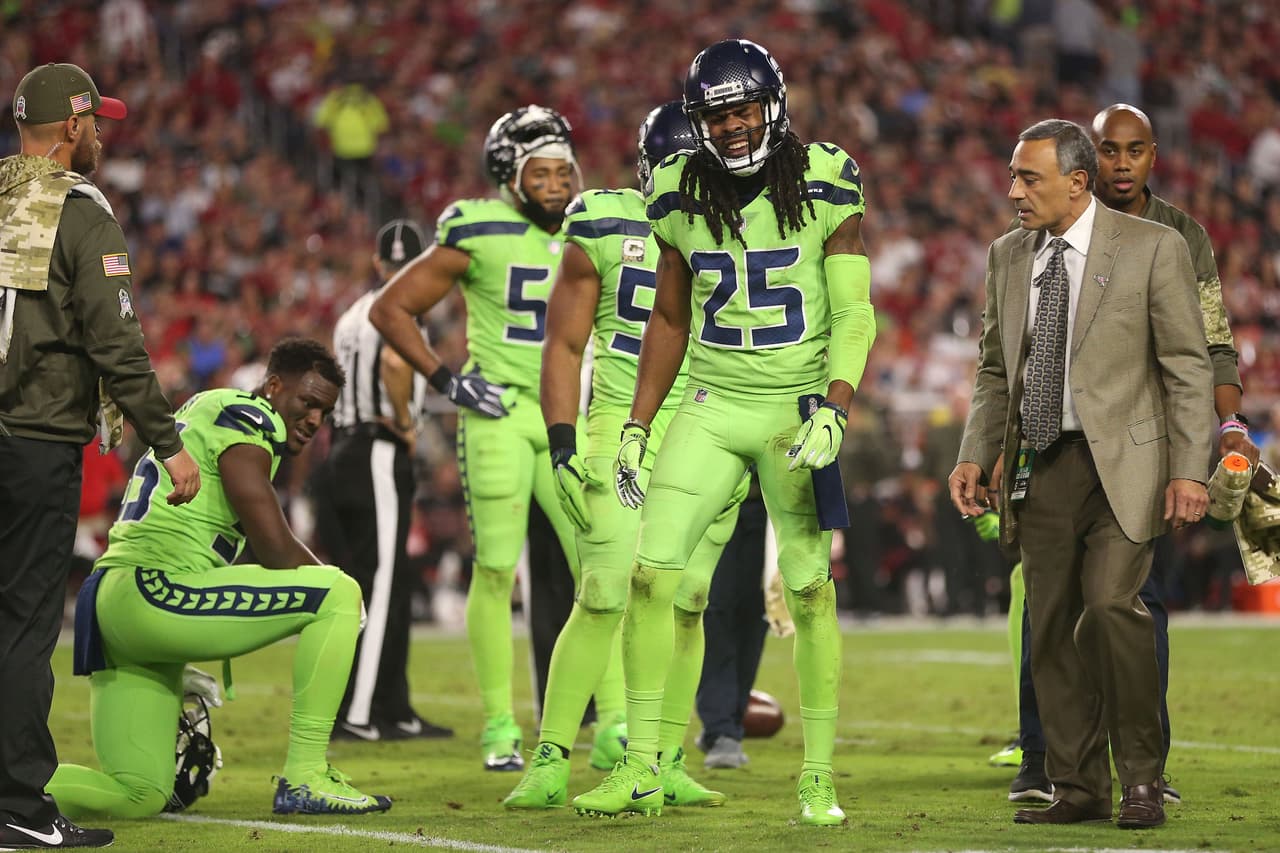 Richard Sherman pasó toda la temporada en recuperación por lesión en los ligamentos. Sherman fue portada de Madden 15.