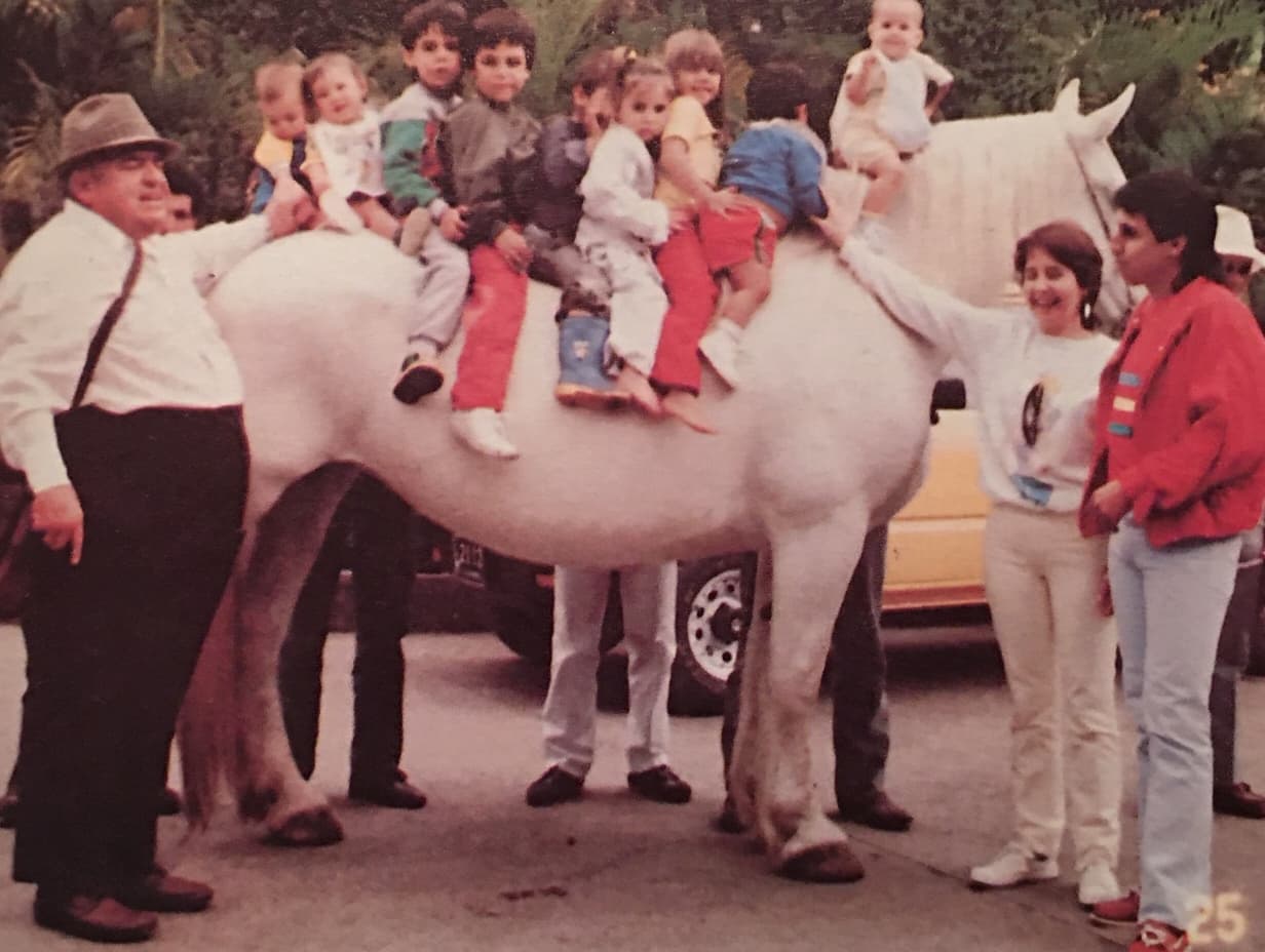'Don Fabio' Ochoa Restrepo (left) with his grandchildren and son, Fabio Ochoa Vazquez (far right).