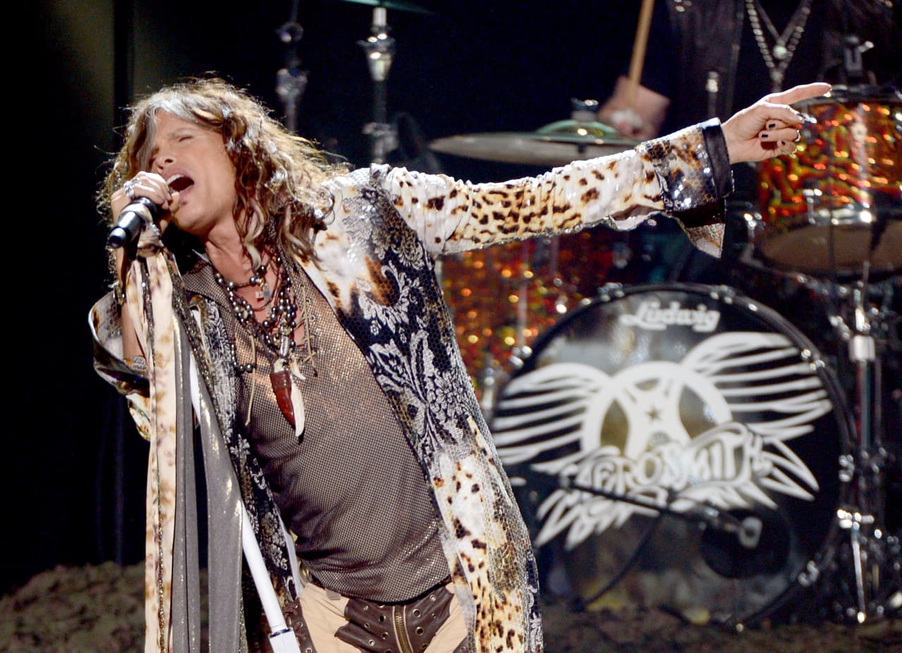 AEROSMITH POSTPONED AMERICAN TOUR TO RECORD NEW ALBUM