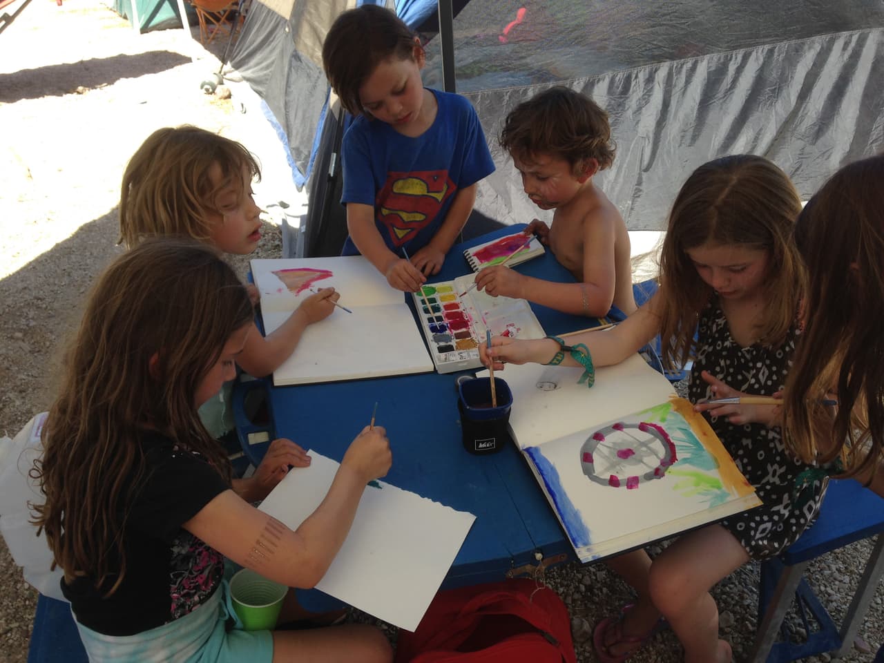 Painting together in family camp, LiB.