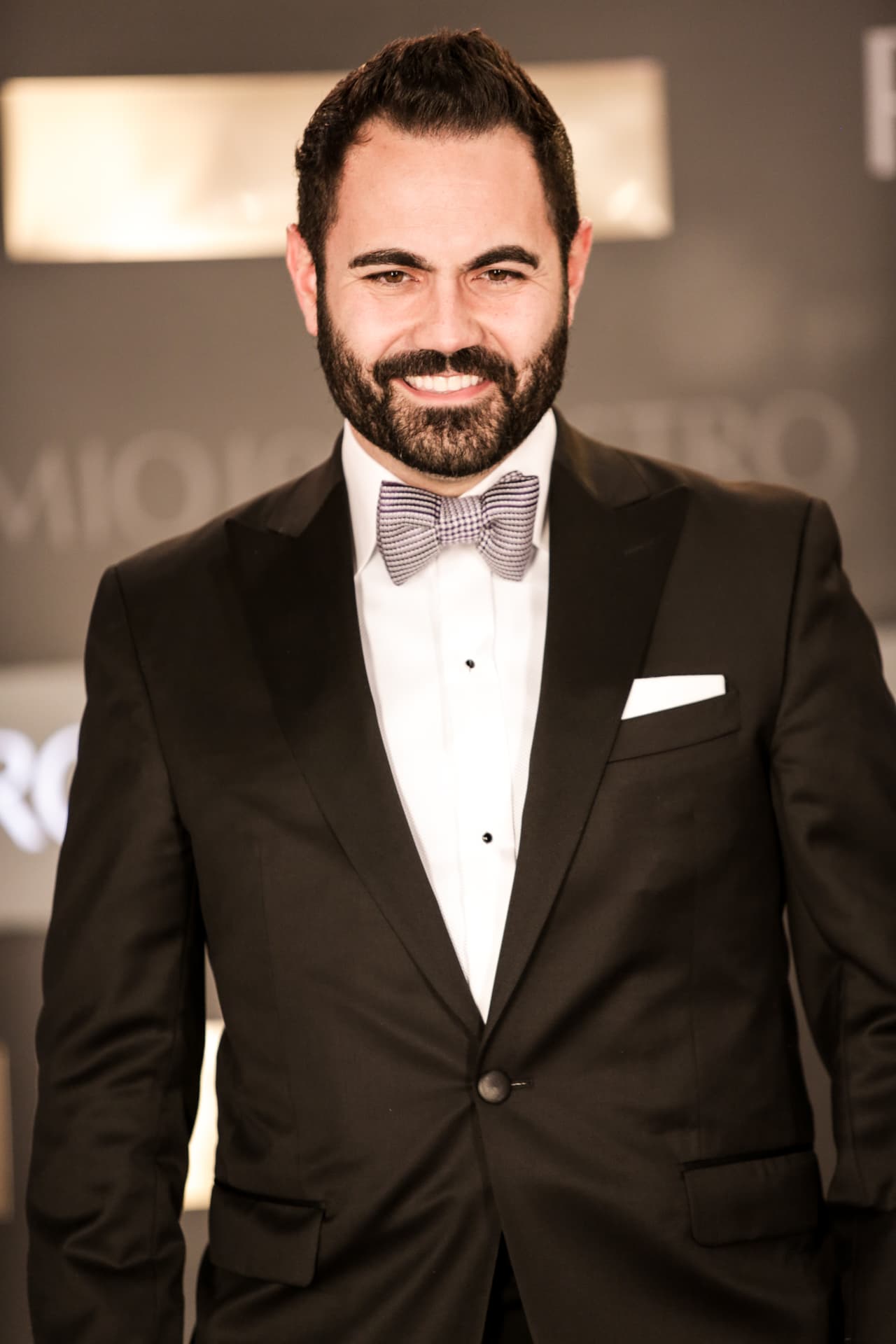 Enrique Santos lució súper guapo.