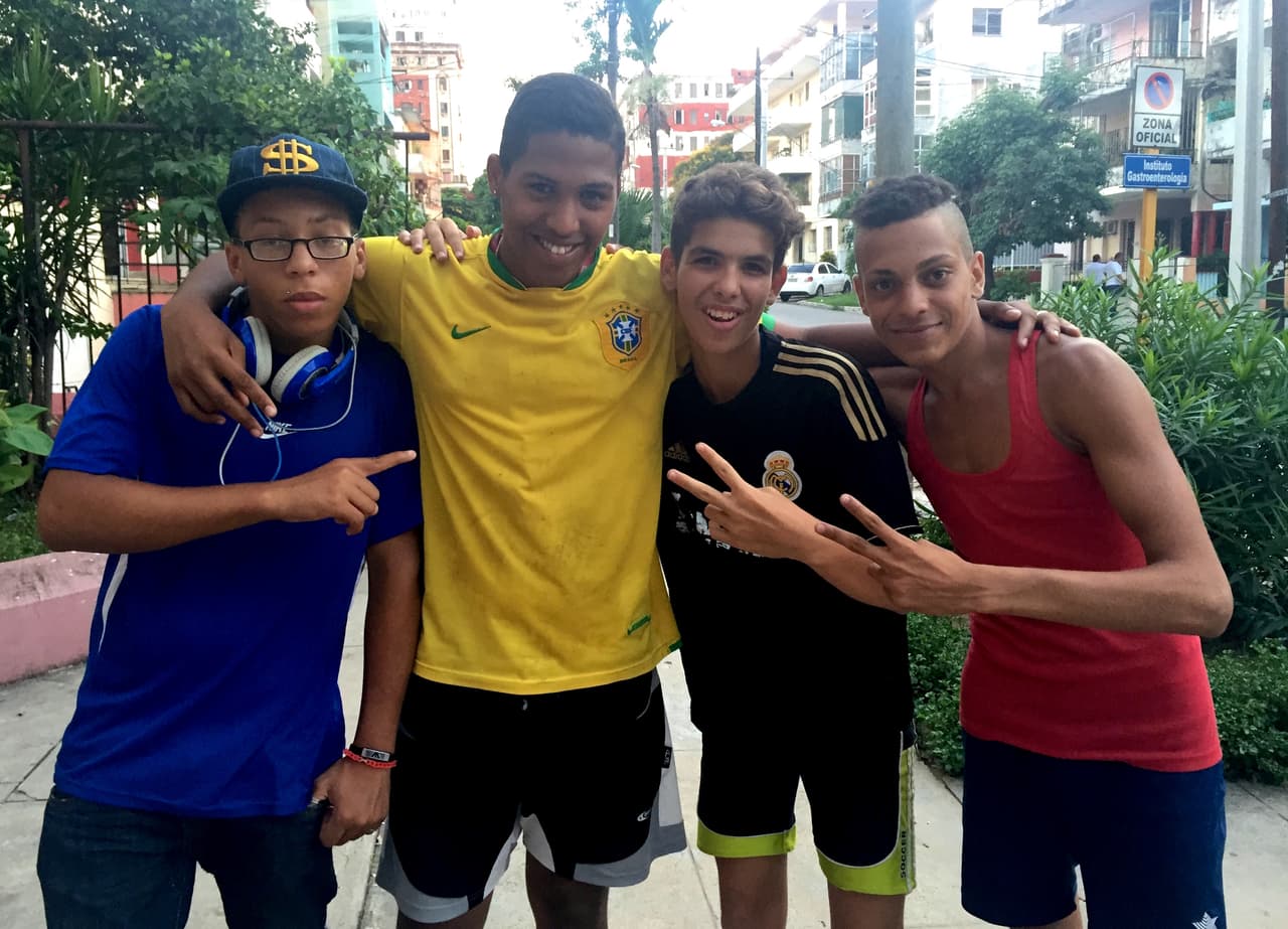From left to right: José Carlos, Jhan Carlos, Leo and Ishmael pose outside of Leo's building in El Vedado.