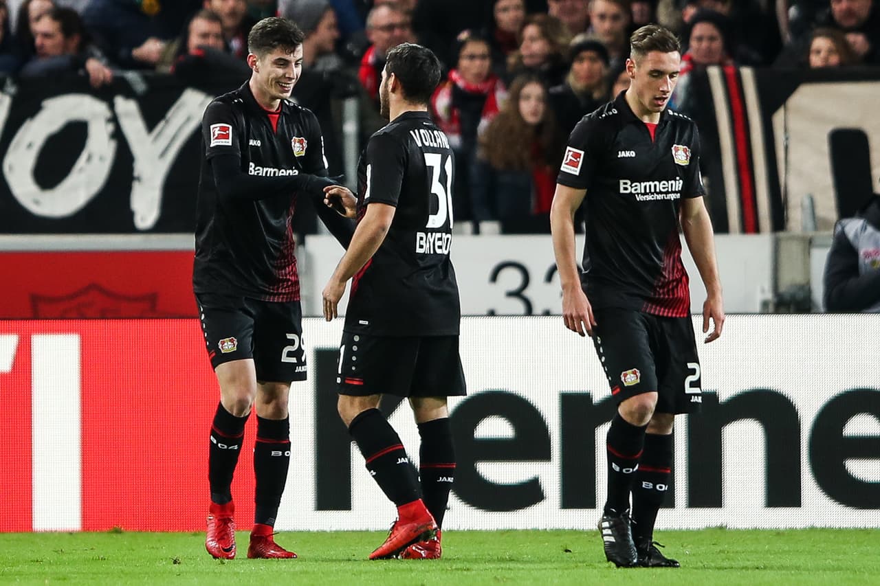 STUTTGART, GERMANY - DECEMBER 08: Kai Havertz #29 of Bayer Leverkusen celebrates with Kevin Volland #31 after scoring his team's first goal to make it 0:1 during the Bundesliga match between VfB Stuttgart and Bayer 04 Leverkusen at Mercedes-Benz Arena on December 8, 2017 in Stuttgart, Germany. (Photo by Alex Grimm/Bongarts/Getty Images)