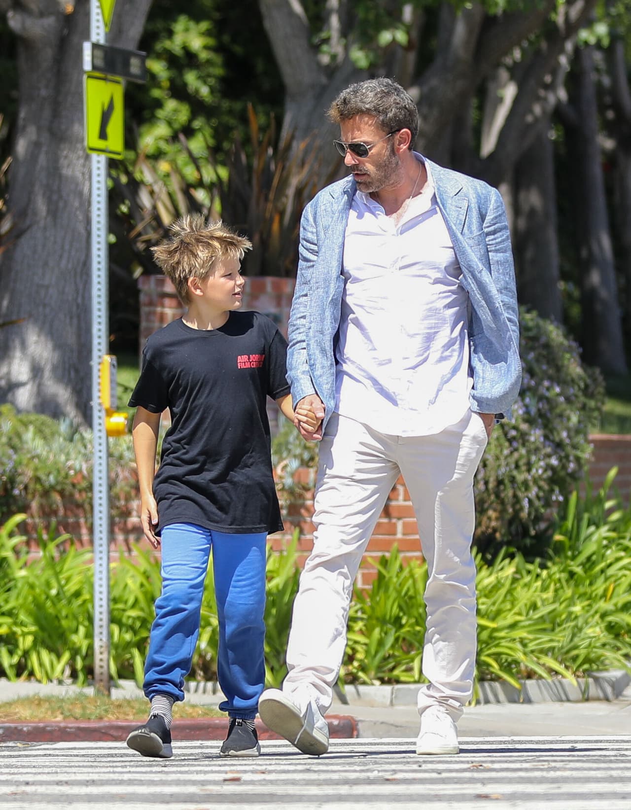 Samuel lucía feliz de reencontrarse con su papá luego de la boda de tres días con su madrastra Jennifer López.