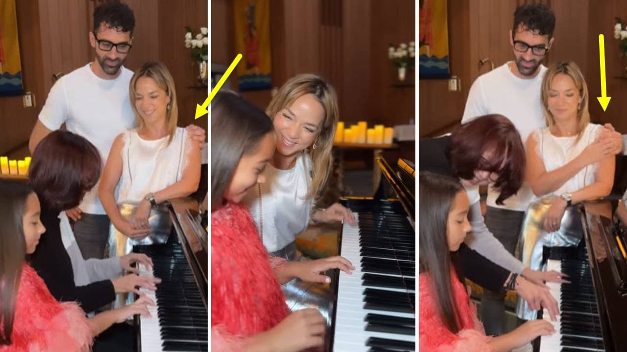 Adamari López y Toni Costa abrazados.