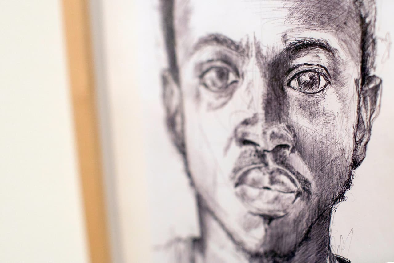 El retrato de Brahima, un inmigrante de Costa de Marfil, en la exhibición 'Krome'.