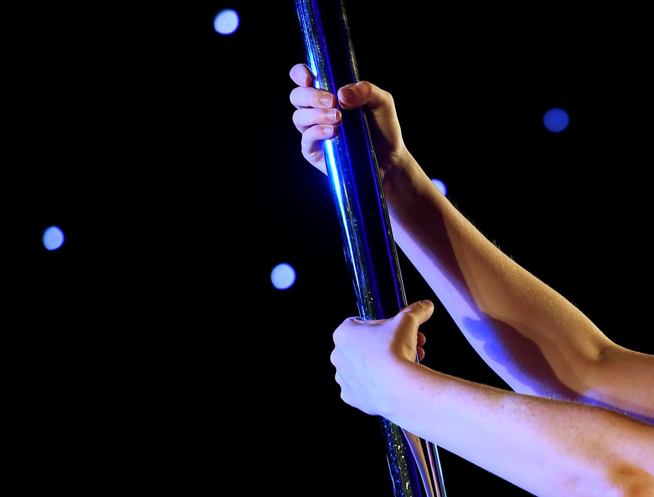 Erika Nusser competes during the 2017 Pacific Pole Championships at the Convention Center in Los Angeles, California on April 8, 2017. Combining dance and acrobatics, originally began as entertainment in strip clubs, pole dancing soon became mainstream as a form of exercise and expression. Competitions are now held in countries throughout the world and has a participant level estimated at over 30,000 in the US. / AFP PHOTO / Mark RALSTON (Photo credit should read MARK RALSTON/AFP/Getty Images)