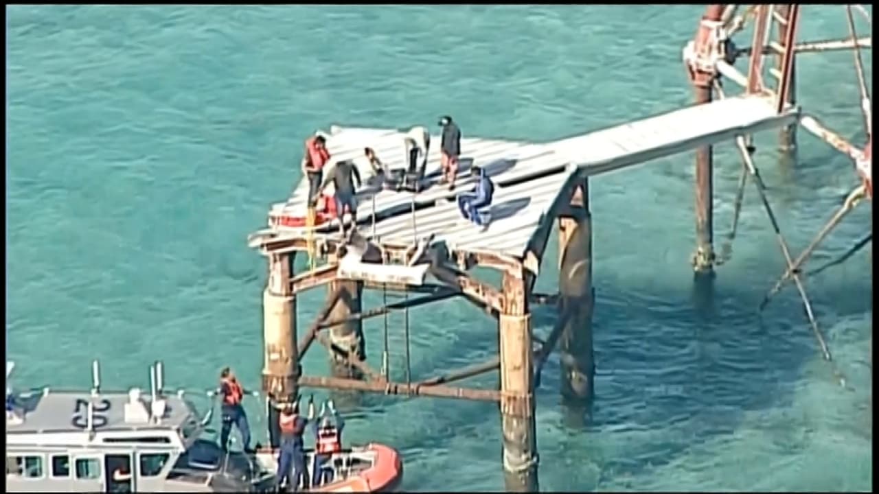 Balseros cubanos aferrados a faro en los Cayos se entregan a las autoridades