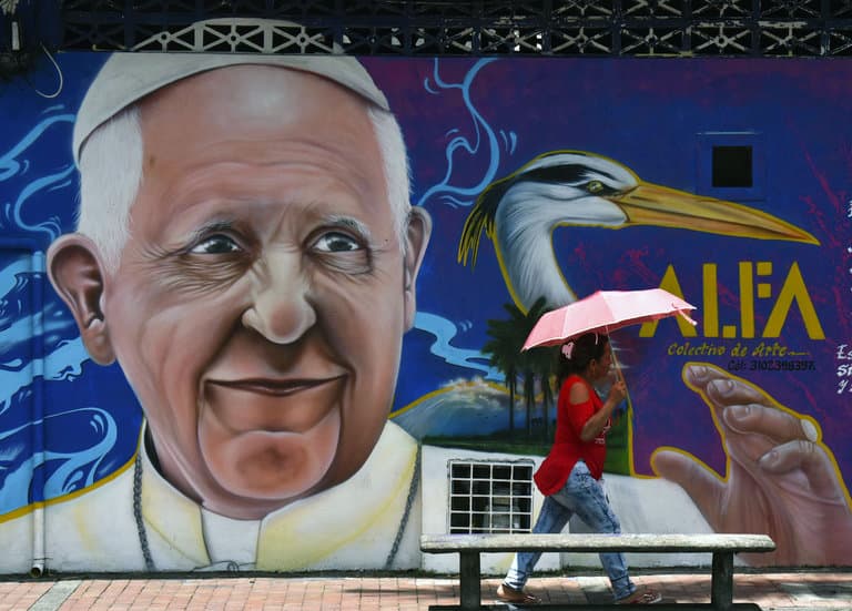 Pope arrives in Colombia seeking to heal wounds of conflict