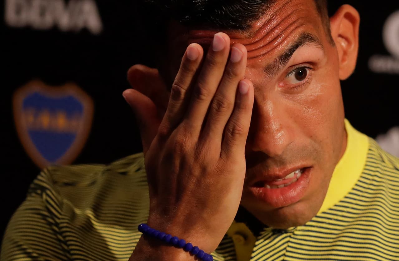 Carlos Tevez attends a press conference during his presentation as a new member of the Boca Juniors soccer team in Cardales, Argentina, Tuesday, Jan. 9, 2018. Tevez joins Boca Juniors for a third time in his career. (AP Photo/Natacha Pisarenko)