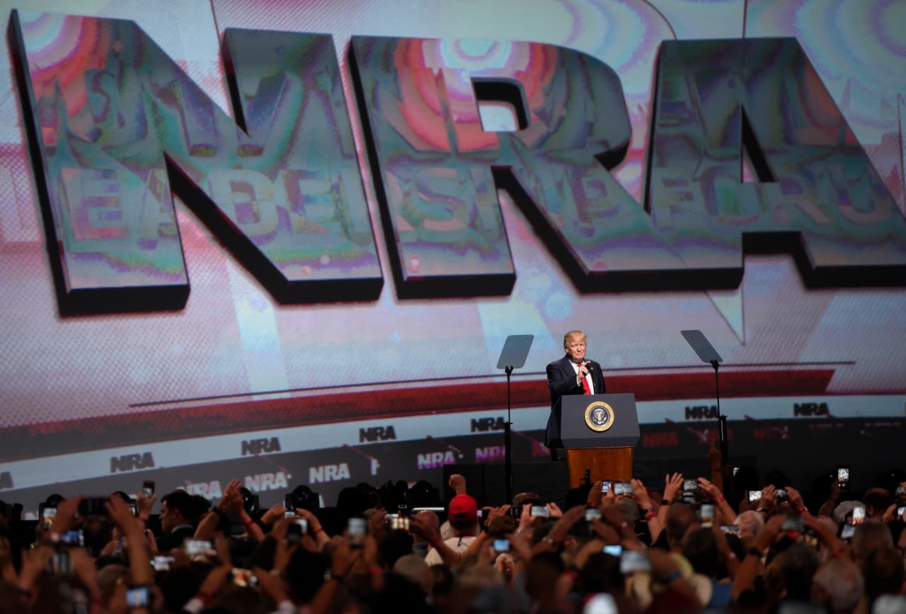President Donald Trump speaks during the National Rifle Association-ILA Leadership Forum, Friday, April 28, 2017, in Atlanta. The NRA is holding its 146th annual meetings and exhibits forum at the Georgia World Congress Center. (AP Photo/Mike Stewart)