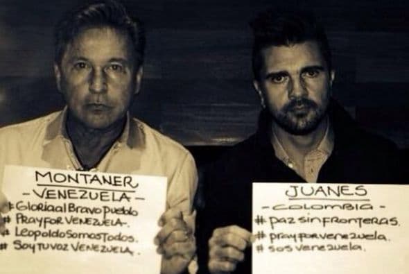 El venezolano Ricardo Montaner, publicó una foto en su Facebook en la que aparece junto al colombiano Juanes portando carteles que dicen, entre otras consignas, "Paz sin Fronteras" y "SOS Venezuela". Foto de Twitter.