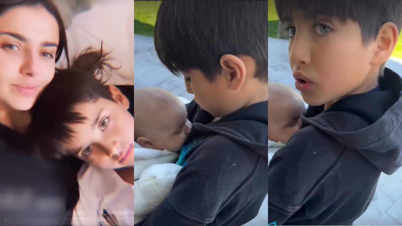 ¡Hijo mayor de Michelle Renaud ya carga a su hermanito a semanas de nacido!: video