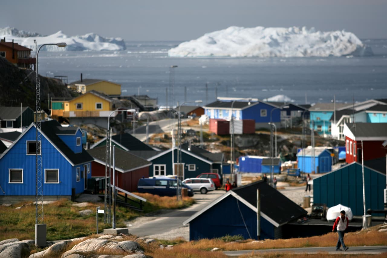 ILULISSAT, GREENLAND - 30 AUGUST: (ISRAEL OUT) A general view August 30, 2007, of the town of Ilulissat Greenland. Even though the disappearing ice cap could lead to higher sea levels all over the world, Greenland's Inuit population are the first to feel the effects of global warming. Records show that the average air temperature has risen by four degrees Celsius over the past decade while the water temperature has climbed by two degrees. Fishermen and hunters avoid the fjords where the ice has become too thin to travel on, and fish such as cod, that prefer warmer water, are beginning to be seen in their nets. (Photo by Uriel Sinai/Getty Images)