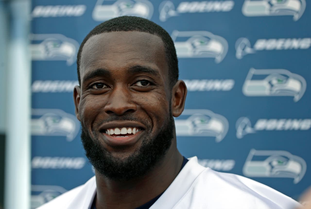 Seattle Seahawks strong safety Kam Chancellor talks to reporters after an NFL football training camp, Monday, July 31, 2017, in Renton, Wash. (AP Photo/Ted S. Warren)
