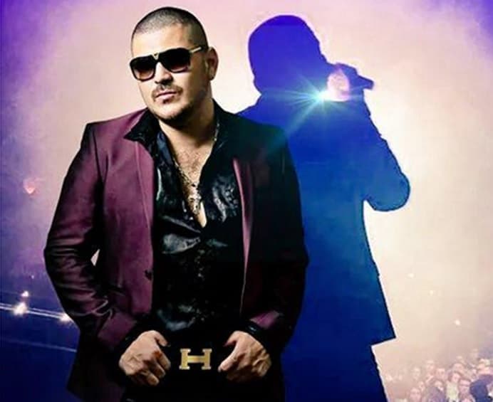 El Komander canceló a pesar de tener seguridad a su lado.