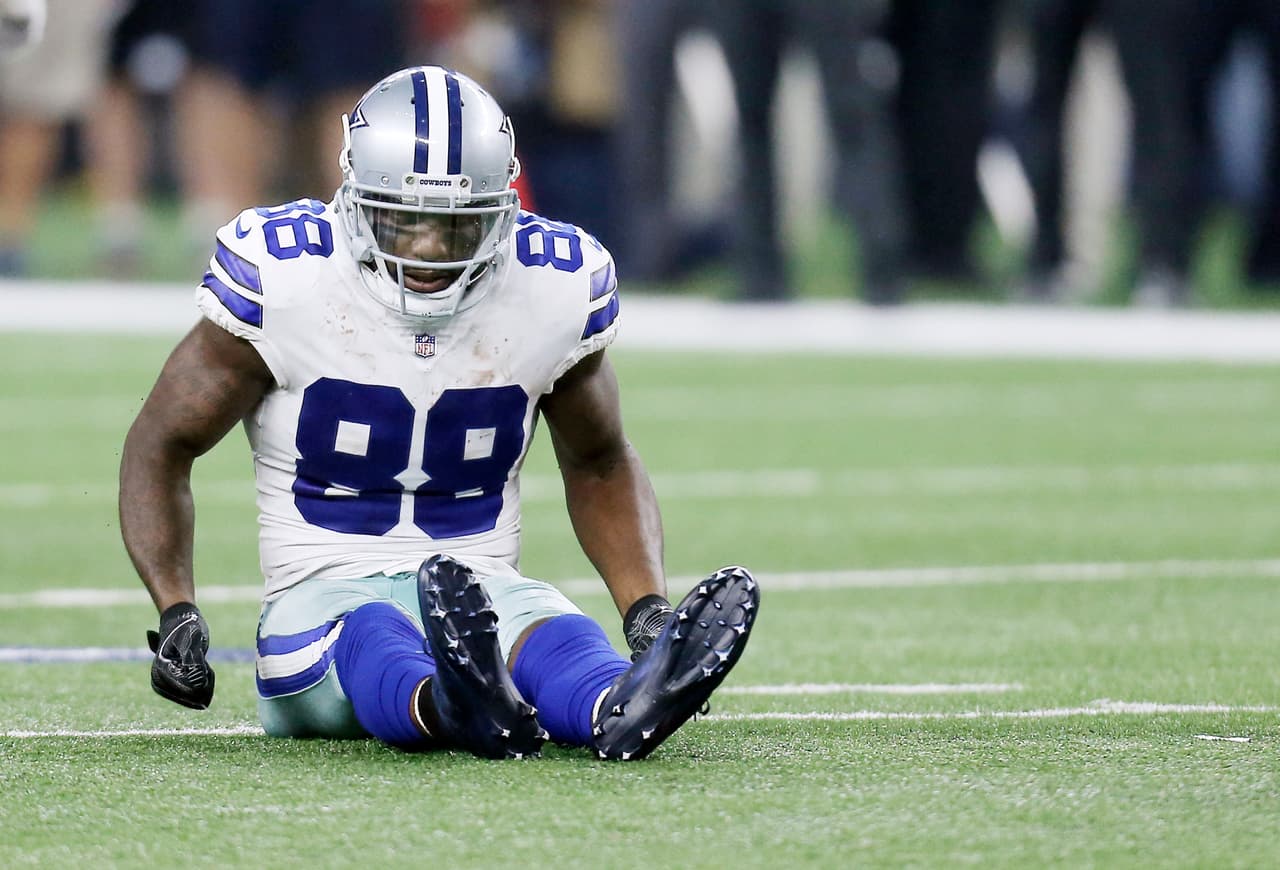 Dallas Cowboys wide receiver Dez Bryant (88) sits on the field after injuring his right ankle during an NFL football game against the Kansas City Chiefs, Sunday, Nov. 5, 2017, in Arlington, Texas. (AP Photo/Brandon Wade)
