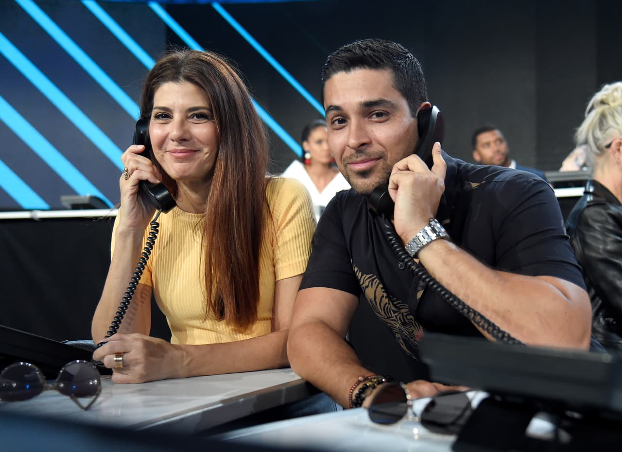 LOS ANGELES, CA - OCTOBER 14: In this handout photo provided by One Voice: Somos Live!, actors Marisa Tomei and Wilmer Valderrama participate in the phone bank onstage during "One Voice: Somos Live! A Concert For Disaster Relief" at the Universal Studios Lot on October 14, 2017 in Los Angeles, California. (Photo by Kevin Mazur/One Voice: Somos Live!/Getty Images)
