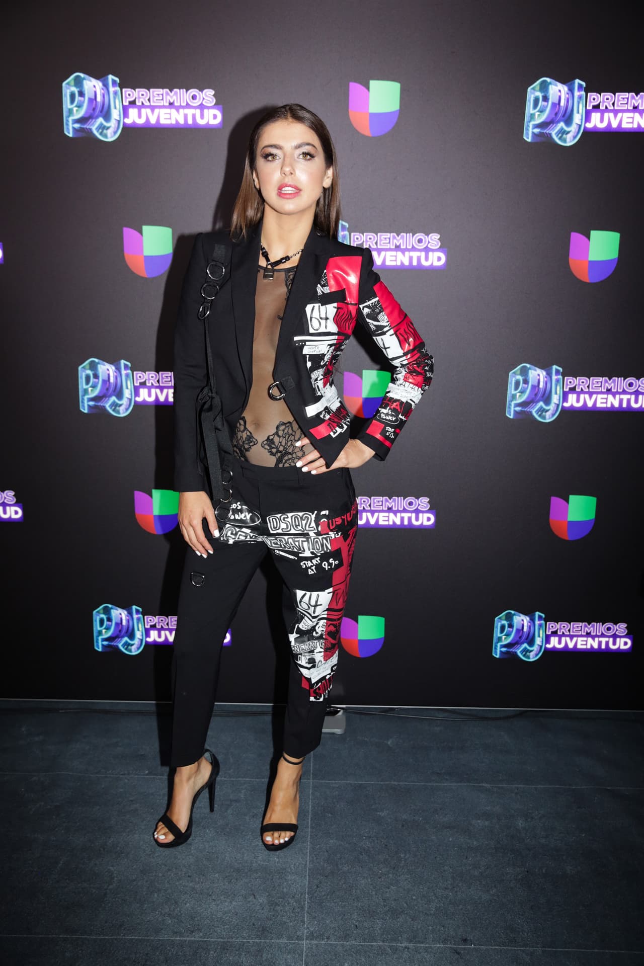 <b>Michelle Renault</b> eligió un traje de pantalón con body transparente de la marca DSquare.