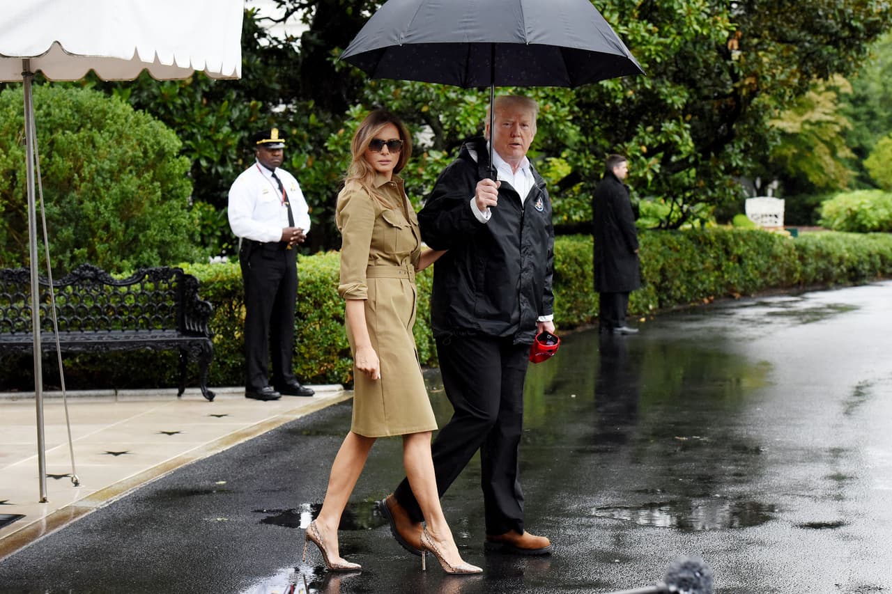 WASHINGTON, DC - SEPTEMBER 2: (AFP OUT) U.S. President Donald Trump walks with first lady Melania Trump prior to their Marine One departure from the White House September 2, 2017 in Washington, DC. The President and first lady are traveling to Texas to visit individuals impacted by Hurricane Harvey. Photo by Olivier Douliery-Pool/Getty Images)