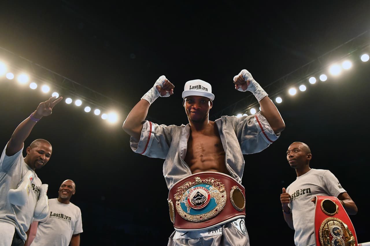 BELFAST, NORTHERN IRELAND - NOVEMBER 18: Zolani Tete celebrates after defeating Siboniso Gonya during their WBO Bantamweight Championship of the World title fight on the Frampton Reborn boxing bill at SSE Arena Belfast on November 18, 2017 in Belfast, Northern Ireland. (Photo by Charles McQuillan/Getty Images)
