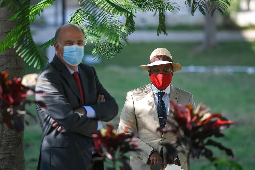 Todd D. Robinson, Assistant Secretary of State for Bureau of International Narcotics and Law Enforcement Affairs, right, and Kenneth H. Merten, the current Haiti Special Coordinator, stand together prior a press conference at the U.S. embassy in Port-au-Prince, Haiti, Tuesday, Nov. 9, 2021.