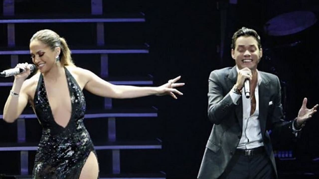 Jennifer López aparece de sorpresa en concierto de Marc Anthony