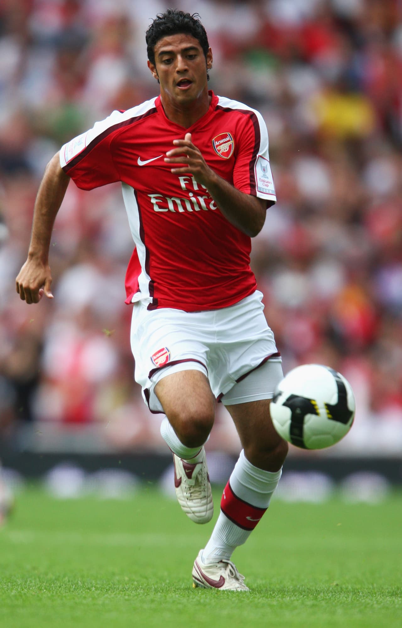 Paso por las filiales del Rebaño sin llegar al primer equipo, después de su participación en el Mundial Sub'17 del 2005, en el cual México término campeón. Vela atrajo el interés de varios equipos y el Arsenal lo ficho en noviembre de 2005.