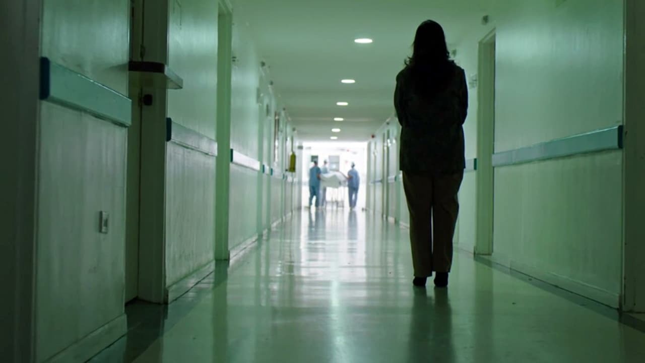 Everything was ready for Amado to enter the operation room. His wife walked beside him on the hallway. Right before the door, Amado and his wife shook hands goodbye.