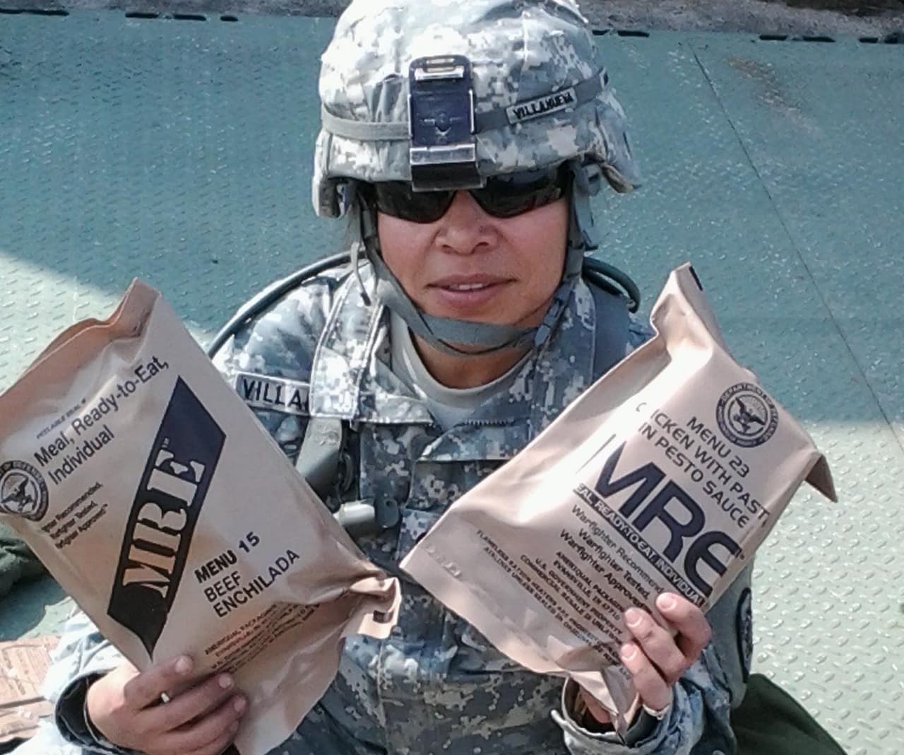 Marta Vazquez holding packets of military rations known as MREs, or 'Meals Ready to Eat.' Vazquez says she suffered sexual and racial abuse in the military, despite a policy of zero tolerance. "They say they have zero tolerance and they give you classes and classes and classes and classes and they nail it to your brain that it is unacceptable, that you have to report," she said.