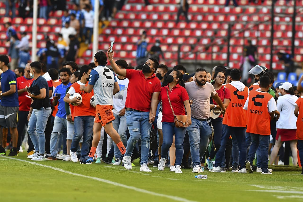 Niño de Querétaro salva vida a fan de Atlas durante actos violentos