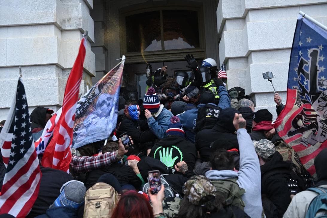 Shortly after 1:00 p.m. on January 6, hundreds of pro-Trump protesters broke through barriers set up along the perimeter of the Capitol where they attacked officers in riot gear.