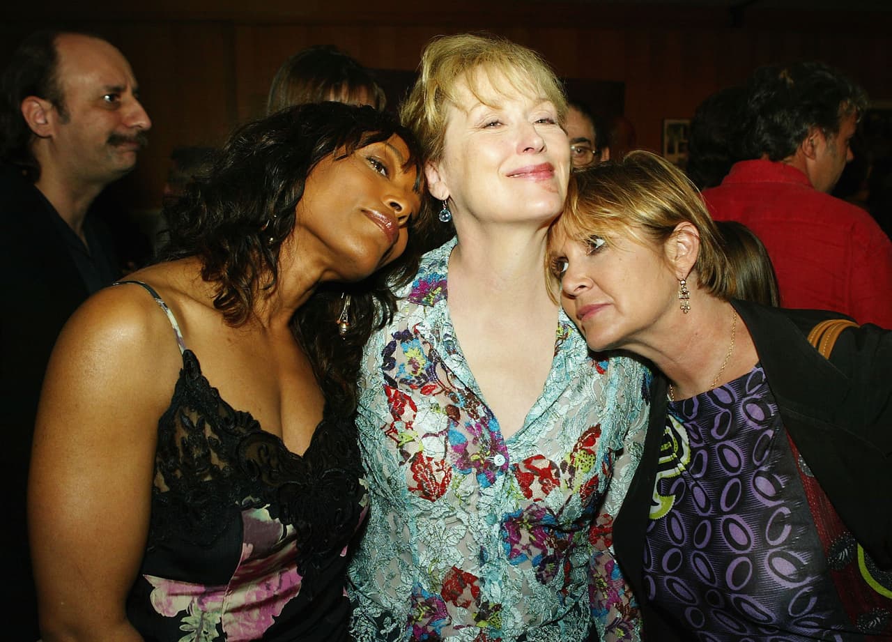 BEVERLY HILLS, CA - JULY 22: (L-R) Actors Angela Bassett, Meryl Streep and Carrie Fisher pose at the after-party for the premiere of Paramounts' "The Manchurian Candidate" at the Samual Goldwyn Theater on July 22, 2004 in Beverly Hills, California. (Photo by Kevin Winter/Getty Images)