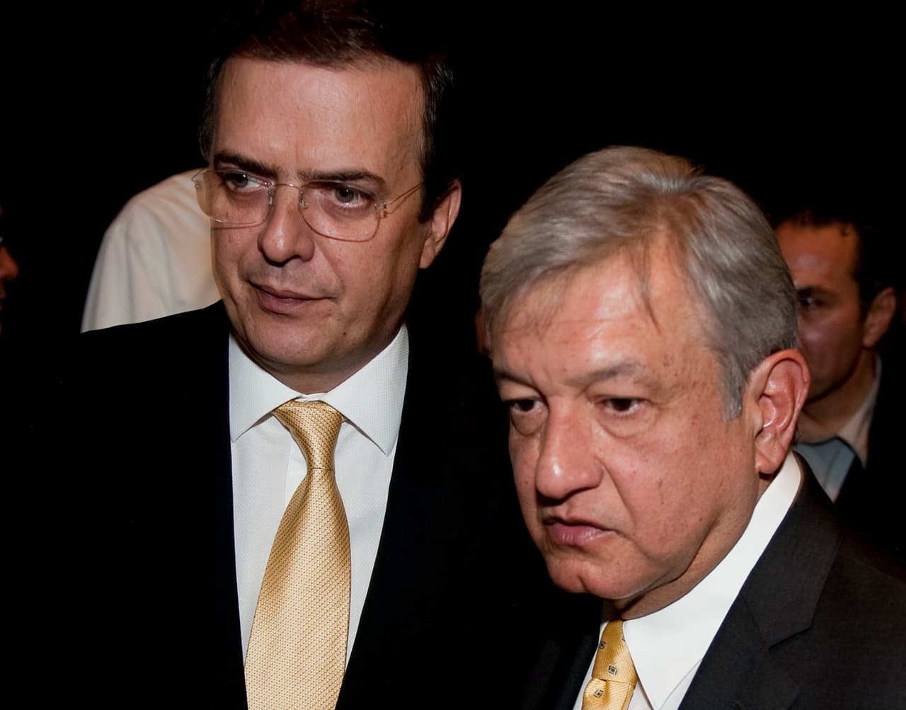 Former Mexican presidential candidate Andres Manuel Lopez Obrador and Mexico city Mayor Marcelo Ebrard leave the building after the press conference where Manuel Lopez Obrador announced his presidential candidacy for Mexican leftist parties on November 15, 2011 in Mexico City. AFP PHOTO/OMAR TORRES (Photo credit should read OMAR TORRES/AFP/Getty Images)