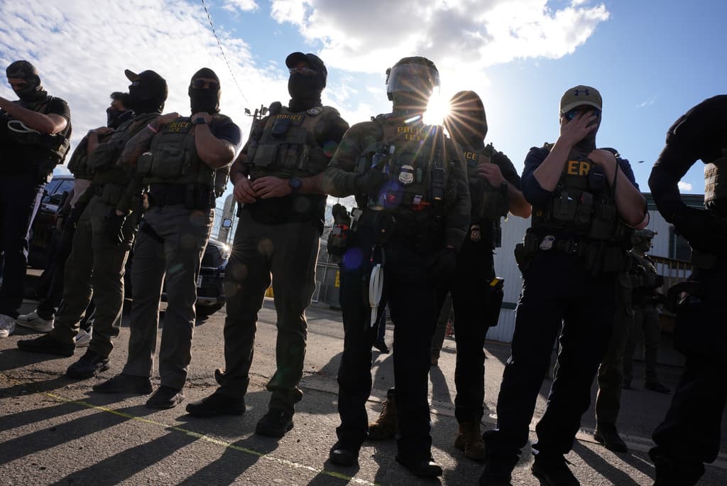 Federal immigration officers confront protesters outside Delaney Hall detention center Thursday, May 28, 2026, in Newark, N.J. (AP Photo/Angelina Katsanis)
